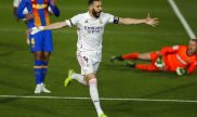 Karin Benzema celebra un gol en el Clásico. Cuotas y pronósticos Barcelona vs real Madrid, LaLiga.